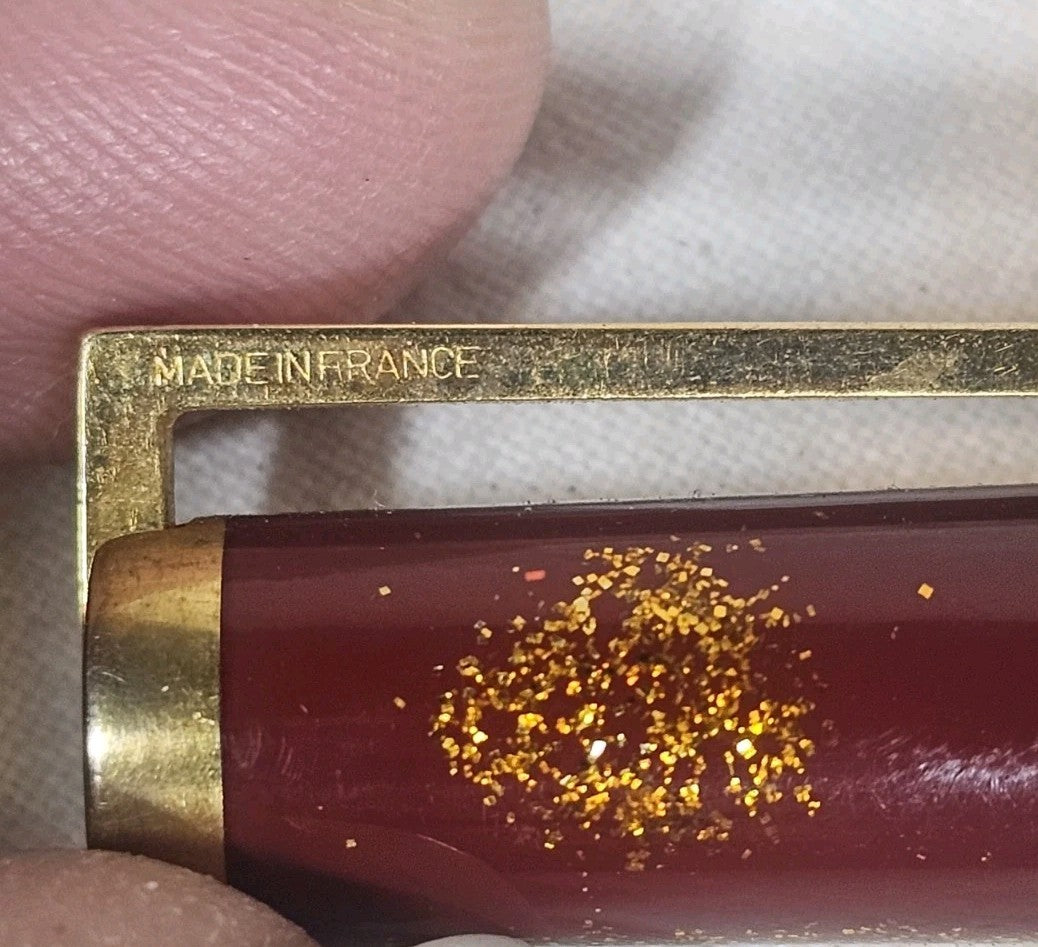 An S.T. Dupont Paris Laque de Chine Red & Gold Ballpoint Pen Gold Plated