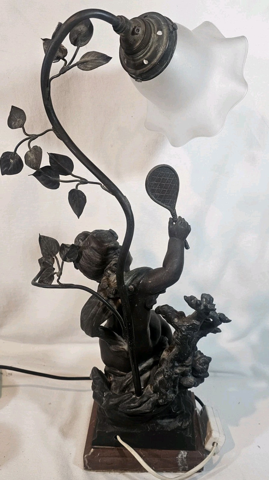 An Antique Spelter Figural Lamp of a Semi Nude Girl Playing Racket Marble Base