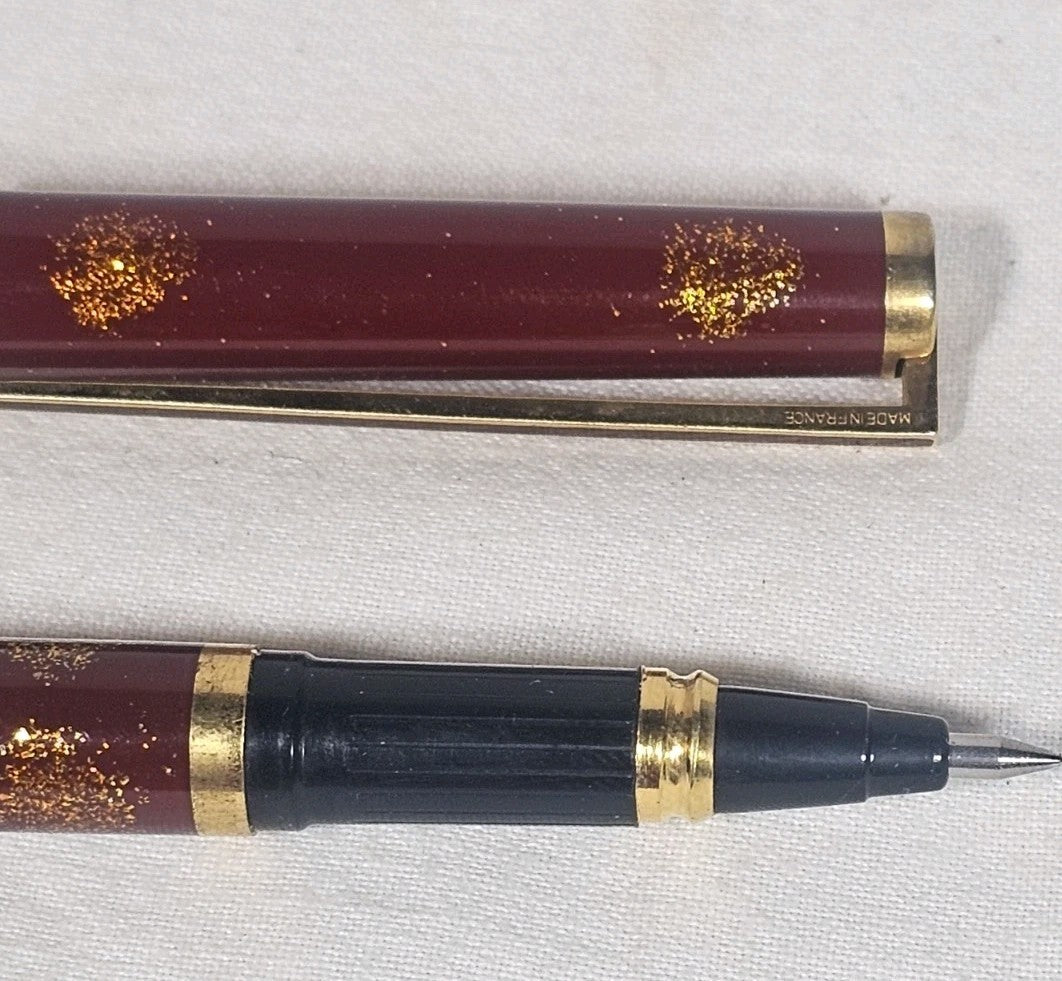 An S.T. Dupont Paris Laque de Chine Red & Gold Ballpoint Pen Gold Plated
