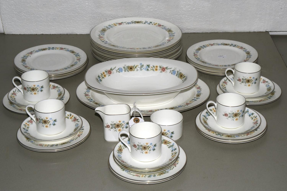A ROYAL DOULTON BONE CHINA PASTORALE PATTERN DINNER SERVICE