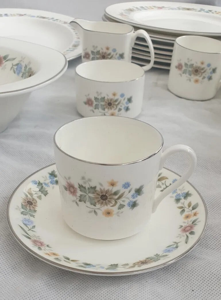 A ROYAL DOULTON BONE CHINA PASTORALE PATTERN DINNER SERVICE