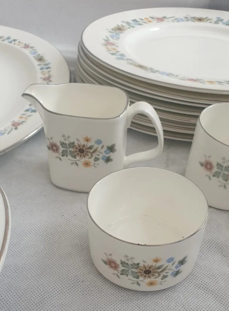 A ROYAL DOULTON BONE CHINA PASTORALE PATTERN DINNER SERVICE