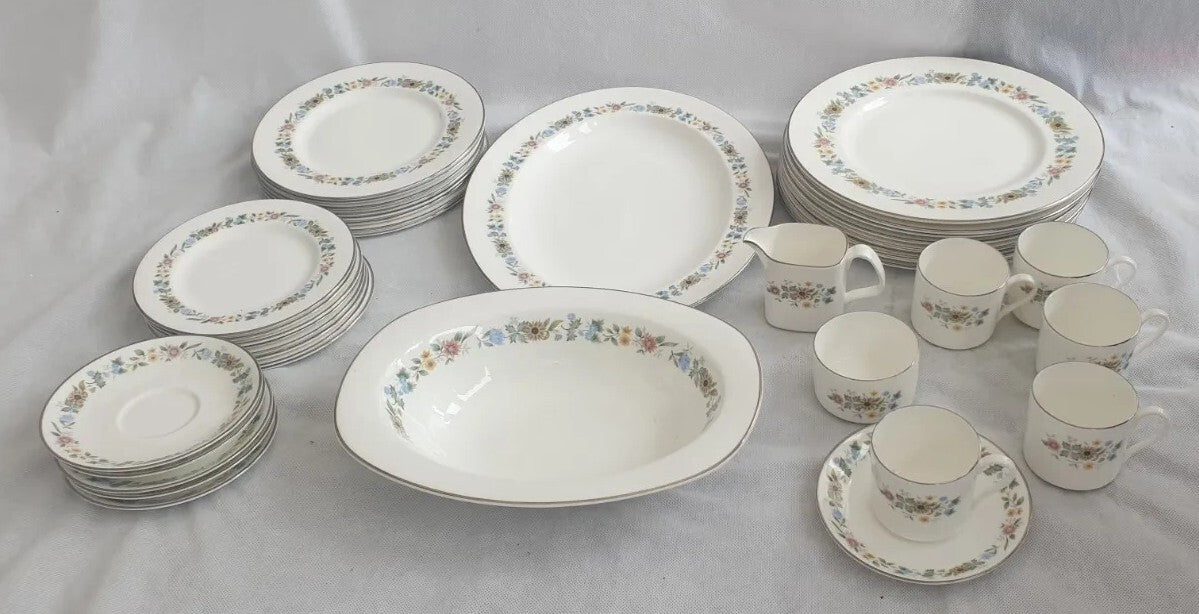 A ROYAL DOULTON BONE CHINA PASTORALE PATTERN DINNER SERVICE