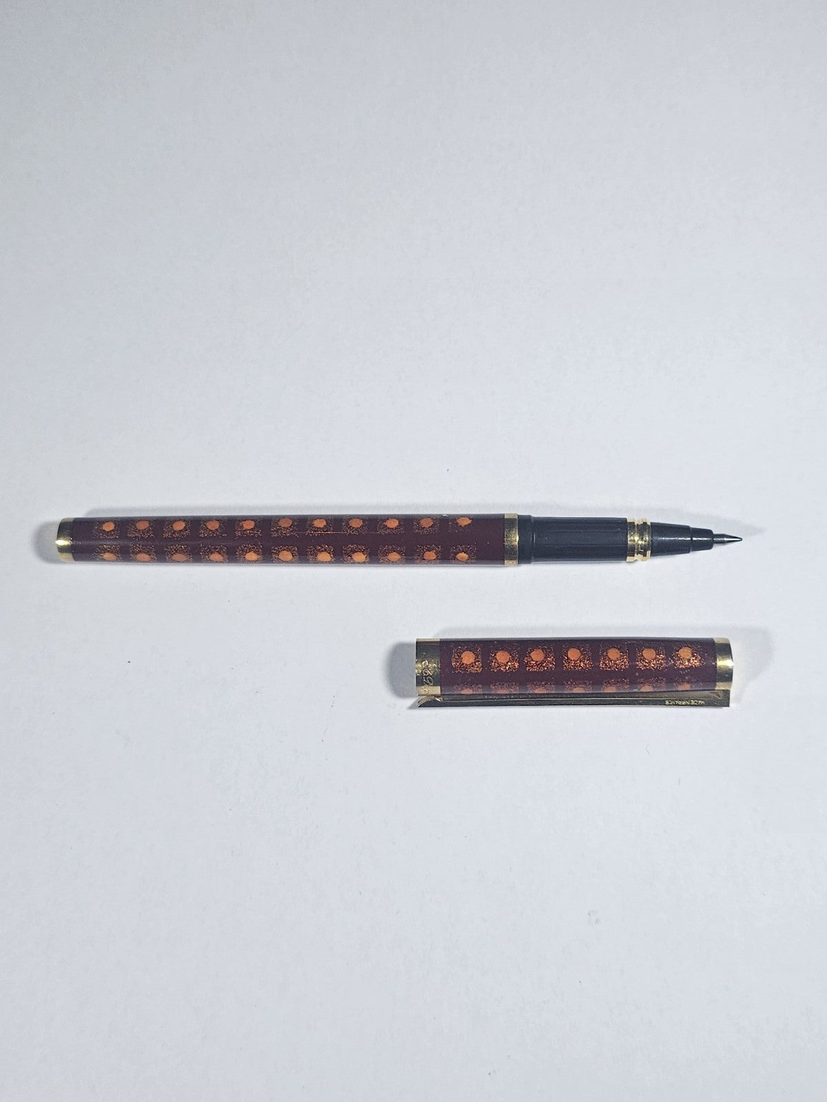 An S.T. Dupont Paris Laque de Chine Red & Gold Ballpoint Pen Gold Plated