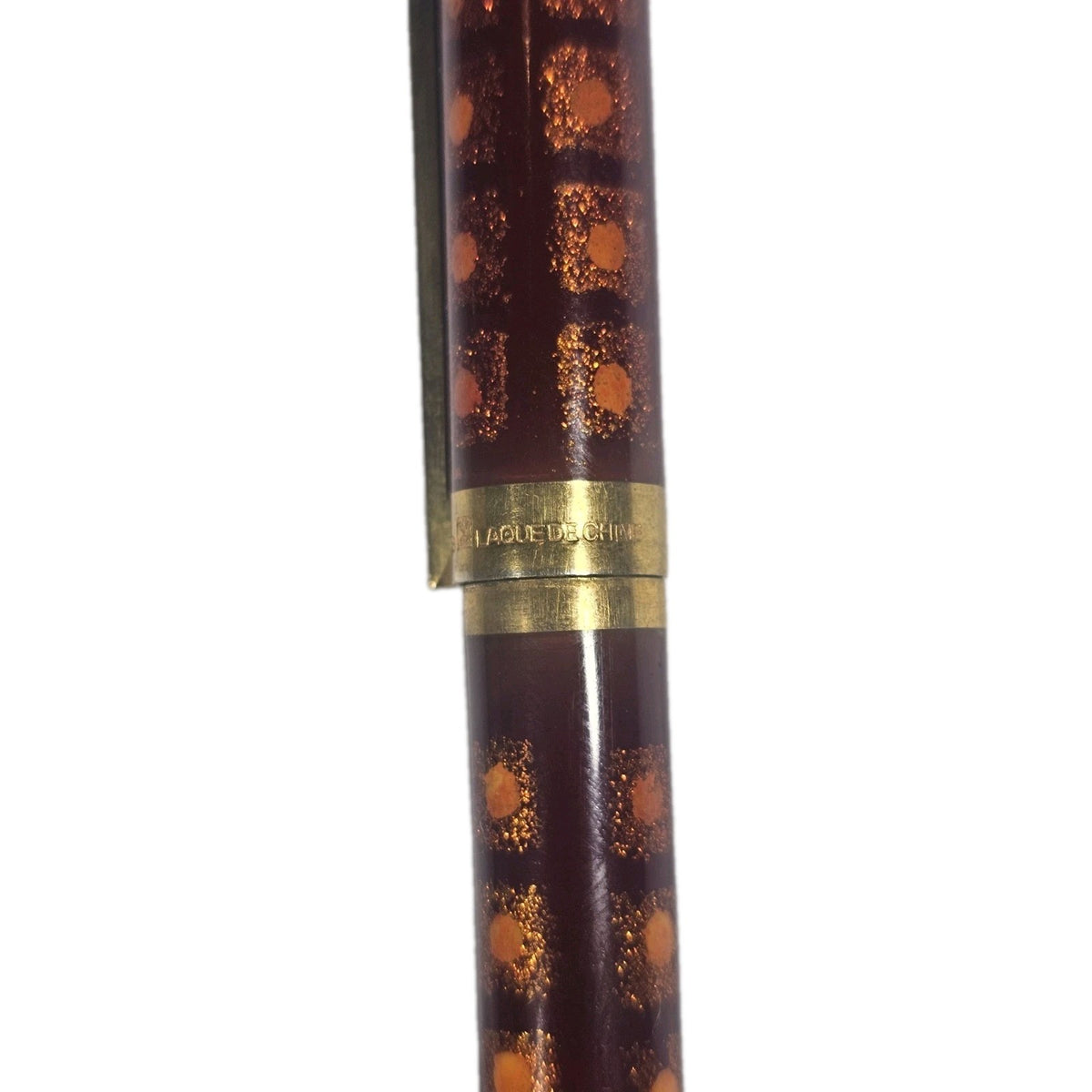 An S.T. Dupont Paris Laque de Chine Red & Gold Ballpoint Pen Gold Plated