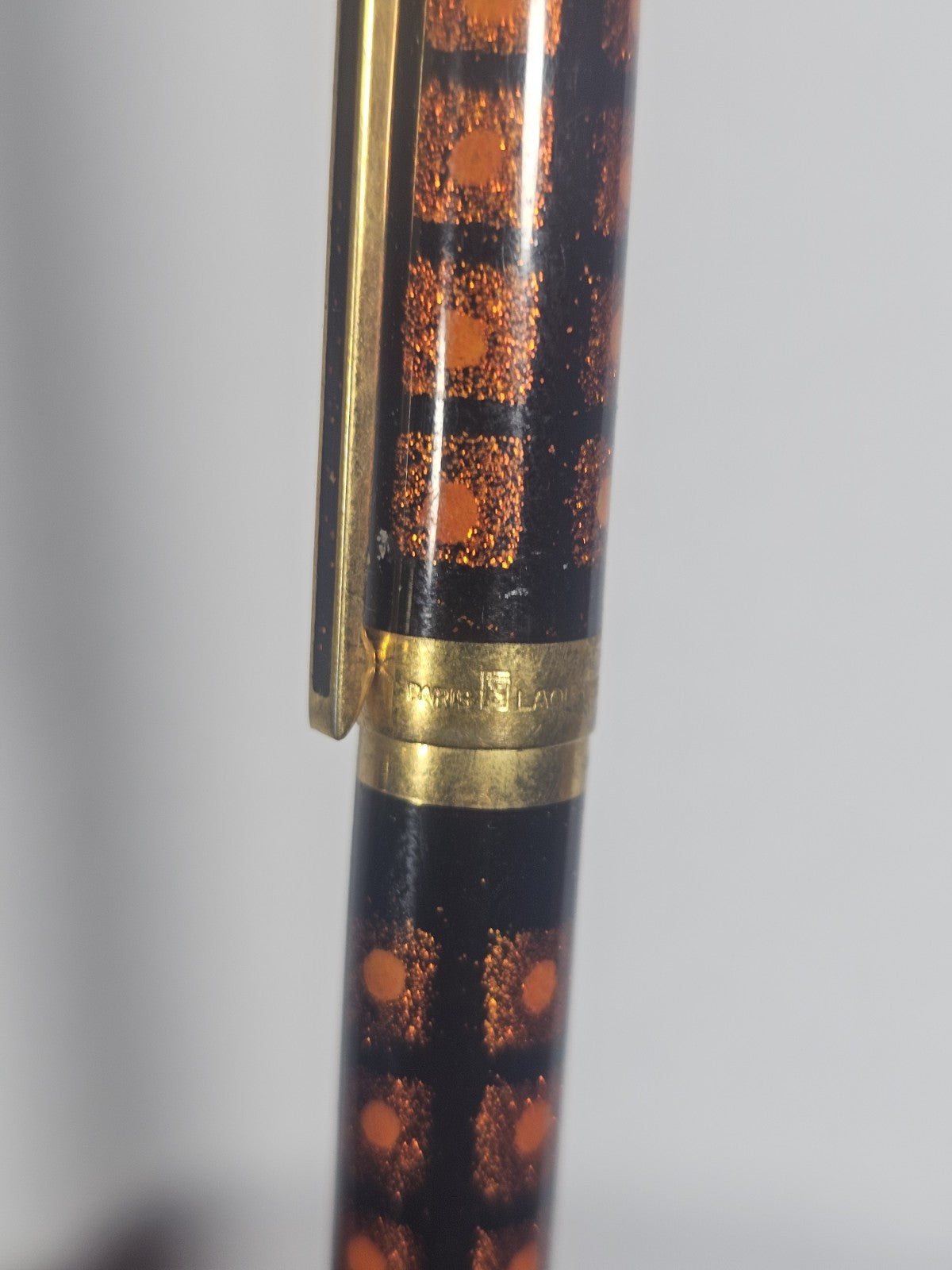 An S.T. Dupont Paris Laque de Chine Red & Gold Ballpoint Pen Gold Plated