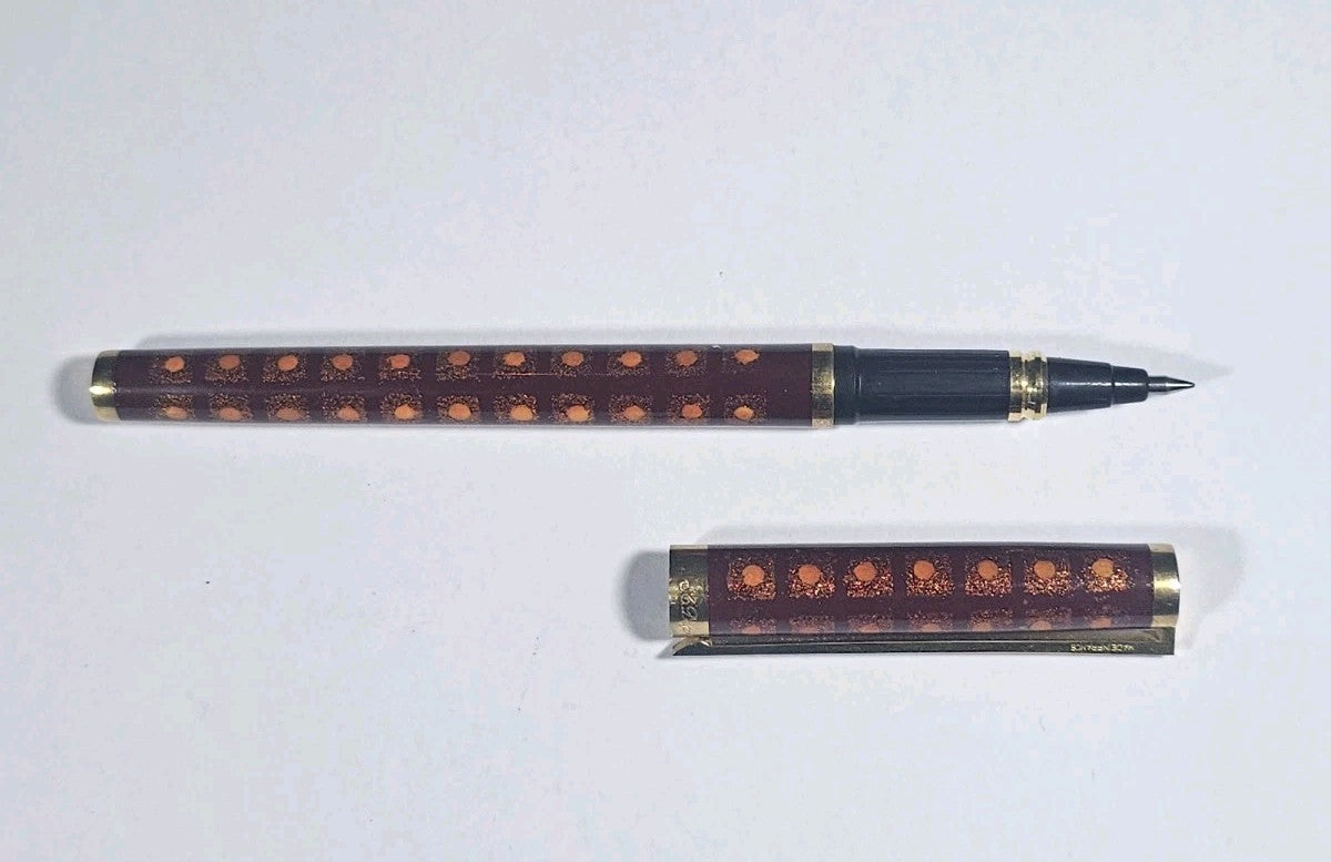 An S.T. Dupont Paris Laque de Chine Red & Gold Ballpoint Pen Gold Plated