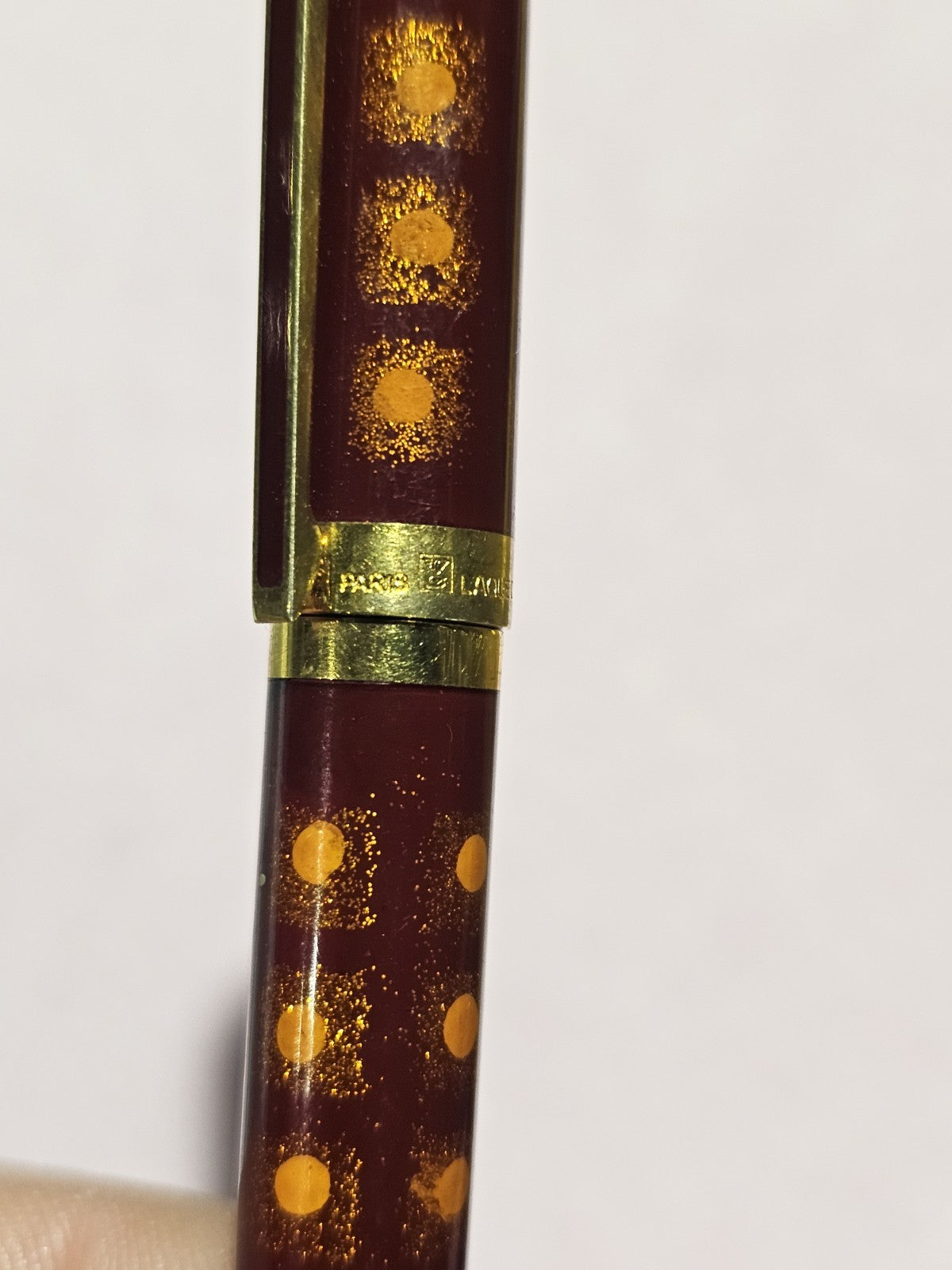 An S.T. Dupont Paris Laque de Chine Red & Gold Ballpoint Pen Gold Plated