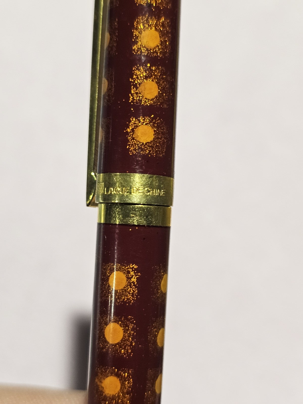 An S.T. Dupont Paris Laque de Chine Red & Gold Ballpoint Pen Gold Plated
