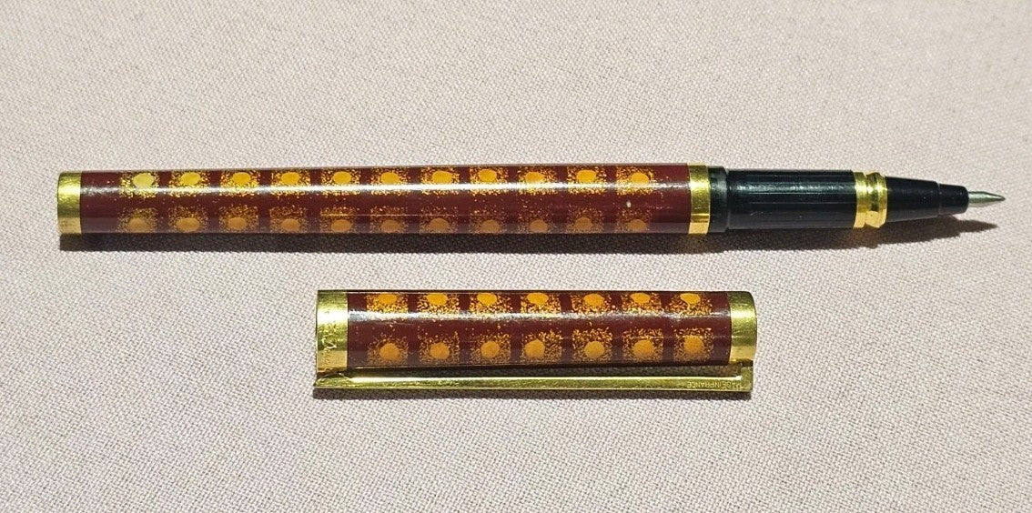An S.T. Dupont Paris Laque de Chine Red & Gold Ballpoint Pen Gold Plated