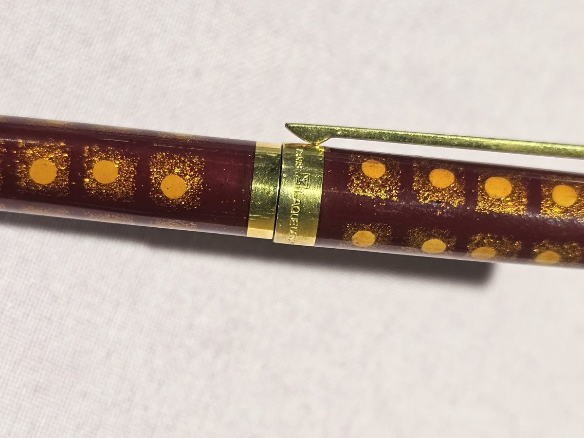 An S.T. Dupont Paris Laque de Chine Red & Gold Ballpoint Pen Gold Plated
