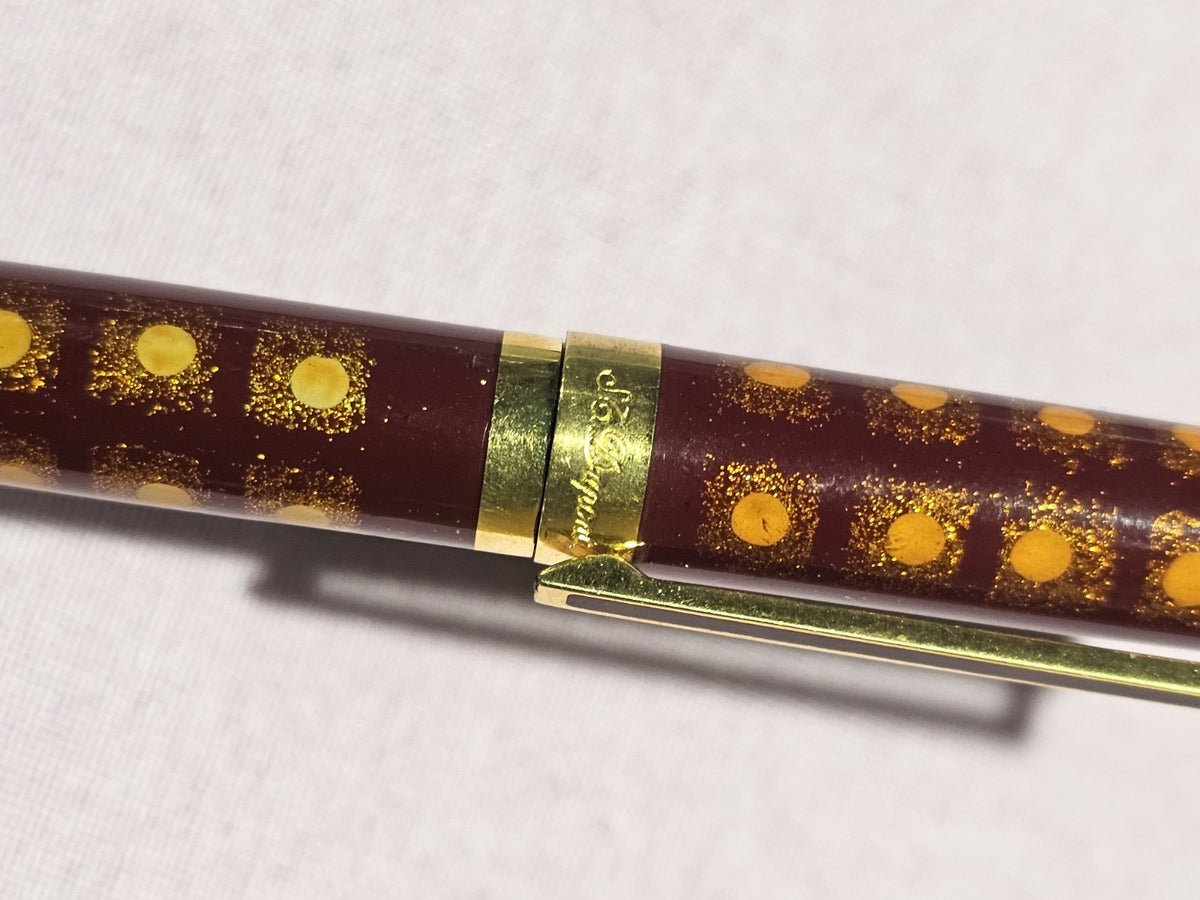 An S.T. Dupont Paris Laque de Chine Red & Gold Ballpoint Pen Gold Plated