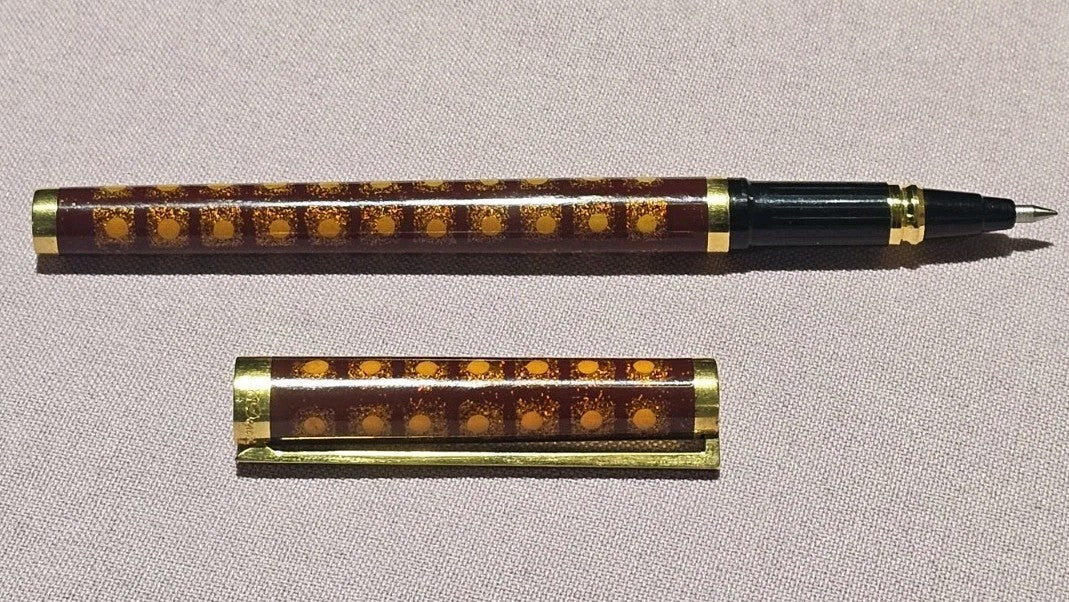 An S.T. Dupont Paris Laque de Chine Red & Gold Ballpoint Pen Gold Plated