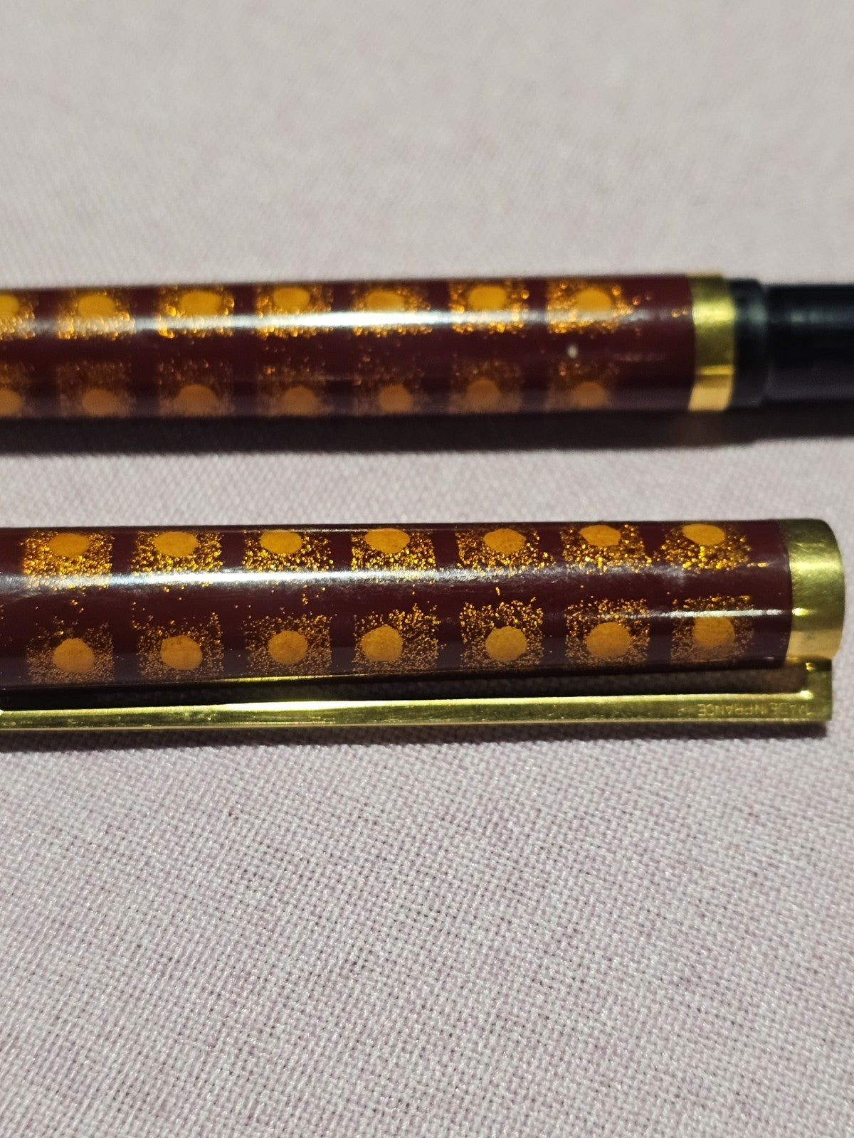 An S.T. Dupont Paris Laque de Chine Red & Gold Ballpoint Pen Gold Plated