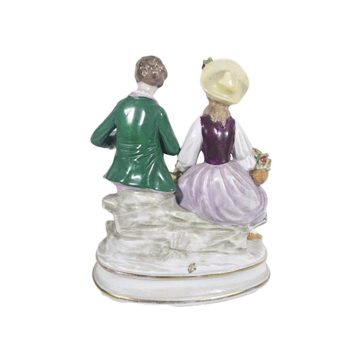 A Victorian German Porcelain Figure Group of a Couple Seated, Hand Painted