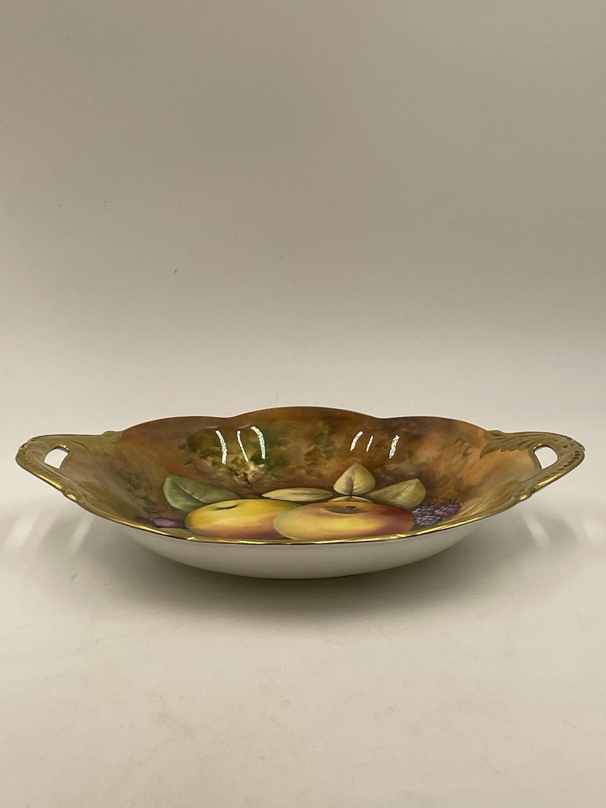 A Coalport Dish, C1970-80, Hand painted by Norman Lear