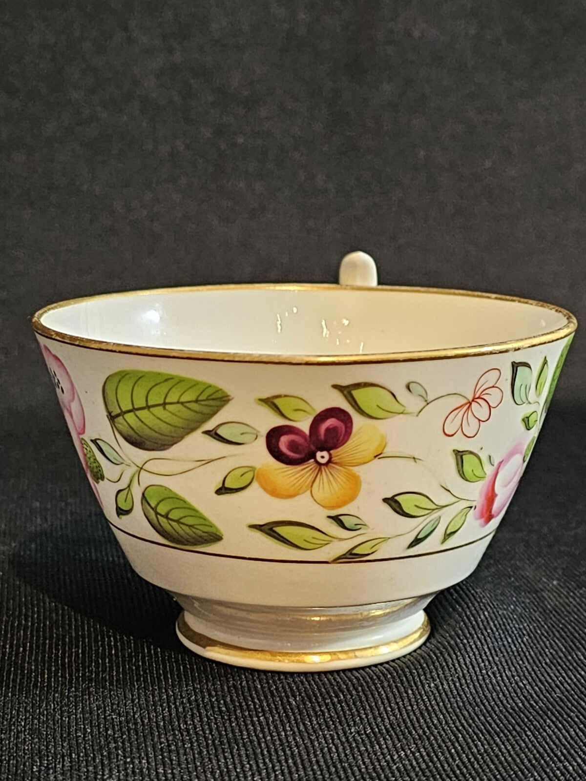 An Early 19thC English Porcelain Tea Cup, Hand Painted with Flowers