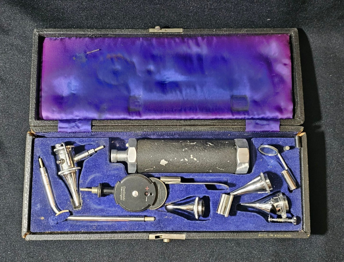 A Vintage Boxed Gowllands Ophthalmoscope Set