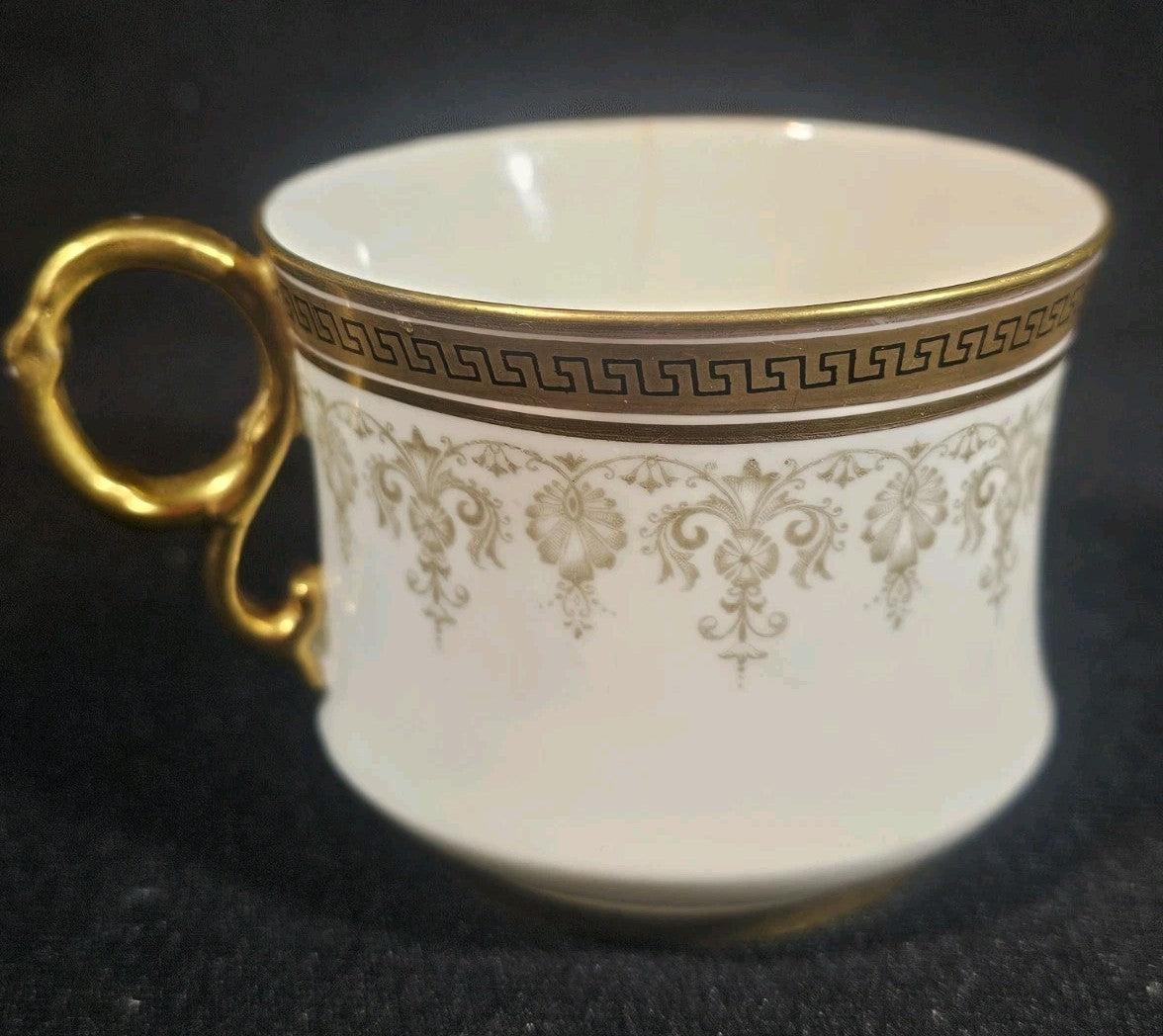 An Antique Cauldon England White and Gold Coffee Cup C1905