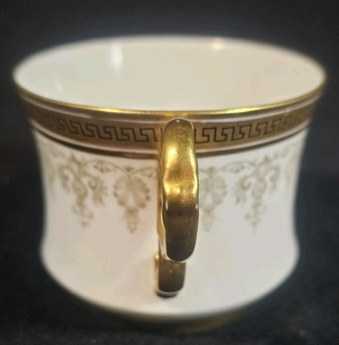 An Antique Cauldon England White and Gold Coffee Cup C1905