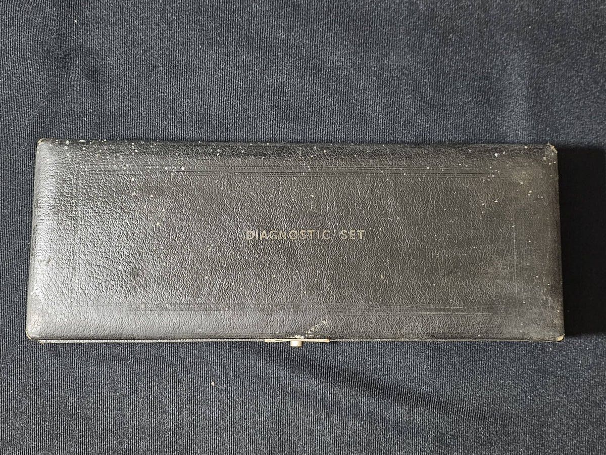 A Vintage Boxed Gowllands Ophthalmoscope Set