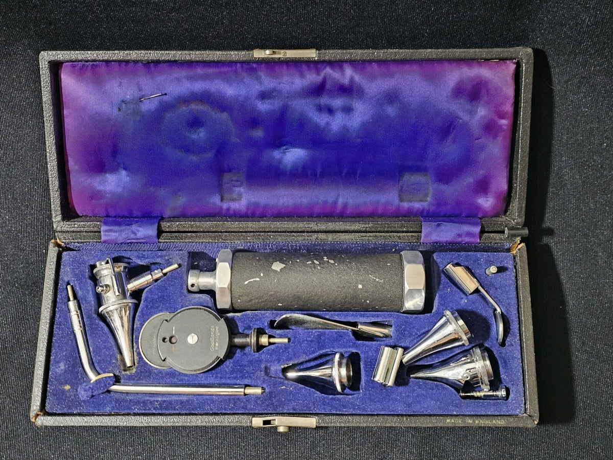 A Vintage Boxed Gowllands Ophthalmoscope Set