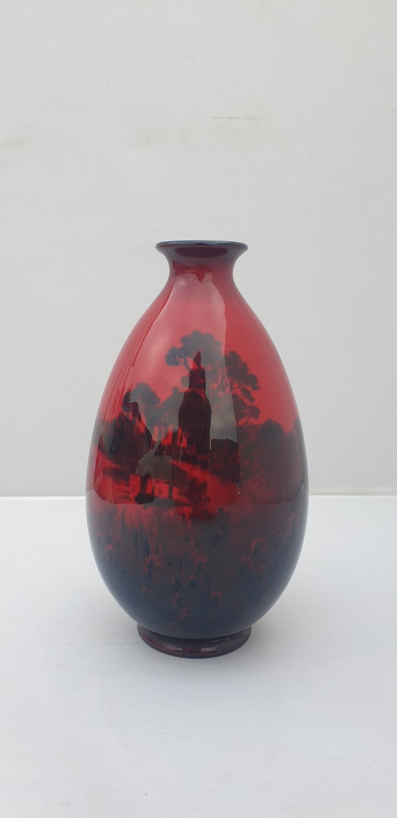 A Royal Doulton flambe landscape vase