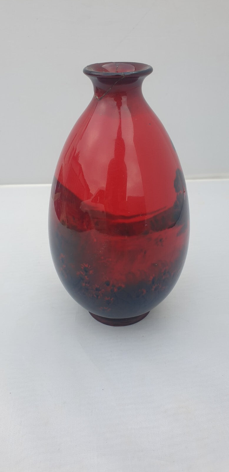 A Royal Doulton flambe landscape vase