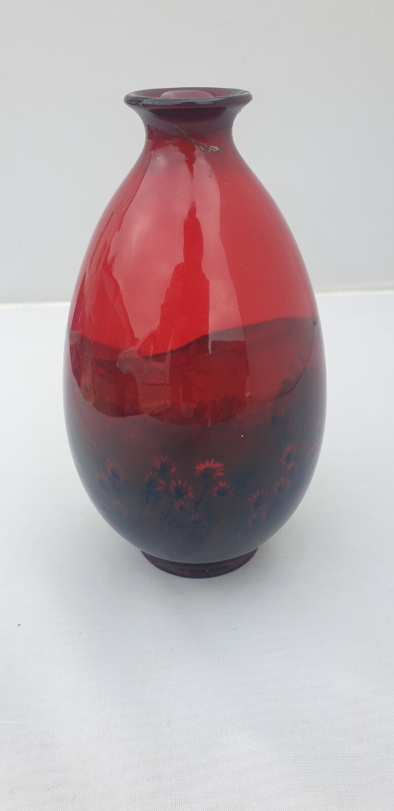 A Royal Doulton flambe landscape vase