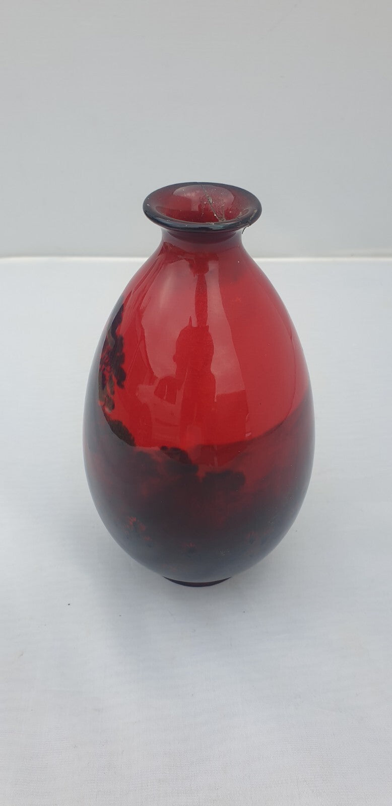 A Royal Doulton flambe landscape vase