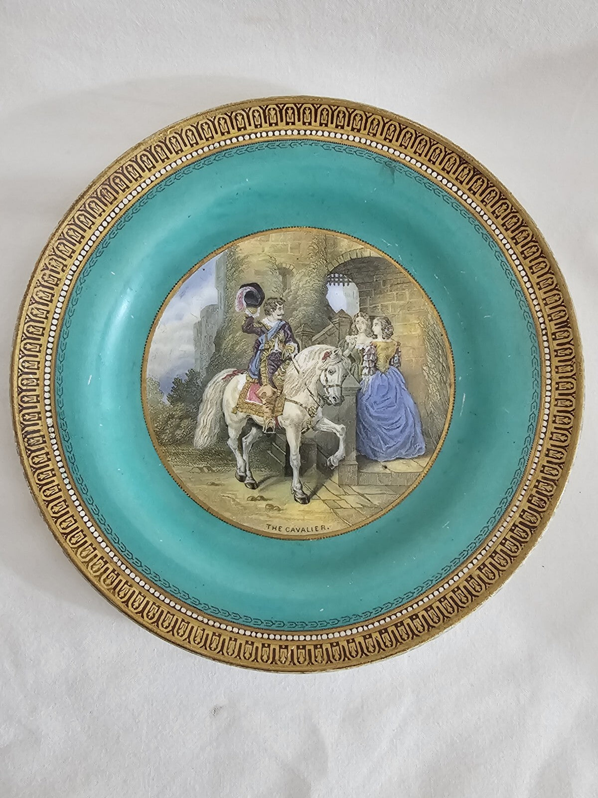 An Antique 19thC Prattware Plate with Green Boarder - The Cavalier
