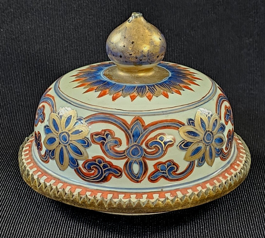 An Antique Chinese Porcelain Vase or Jar Cover, Encased in Brass