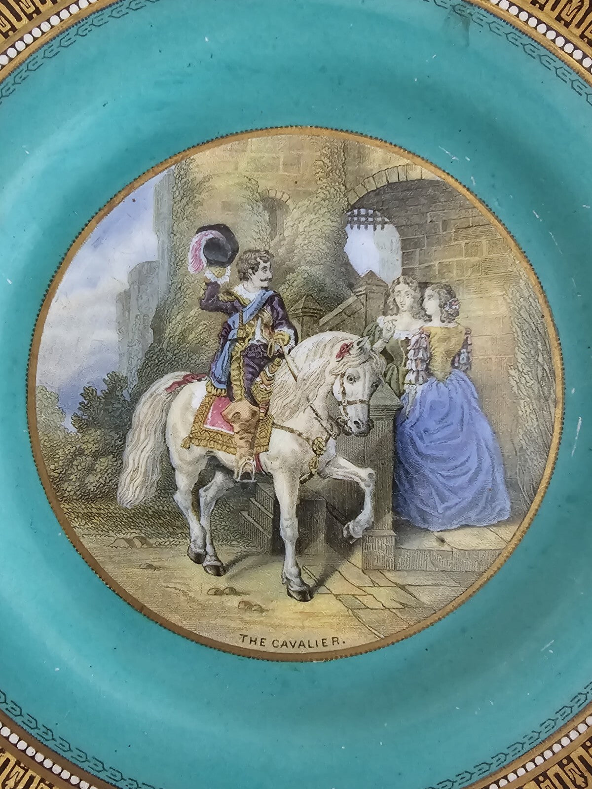 An Antique 19thC Prattware Plate with Green Boarder - The Cavalier