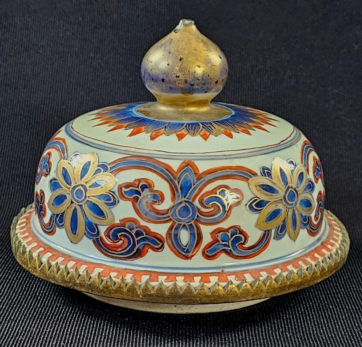 An Antique Chinese Porcelain Vase or Jar Cover, Encased in Brass