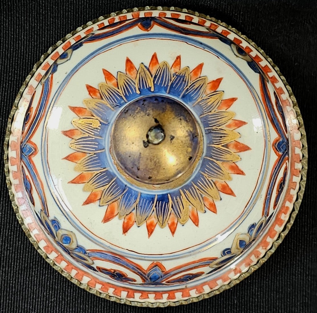 An Antique Chinese Porcelain Vase or Jar Cover, Encased in Brass
