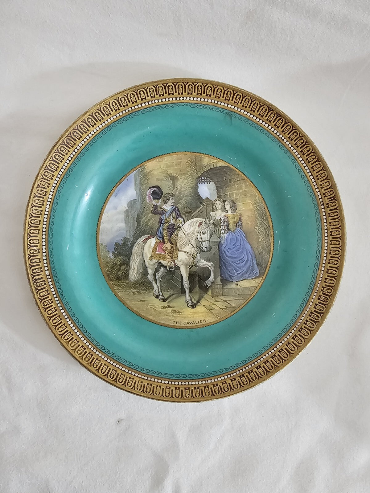 An Antique 19thC Prattware Plate with Green Boarder - The Cavalier