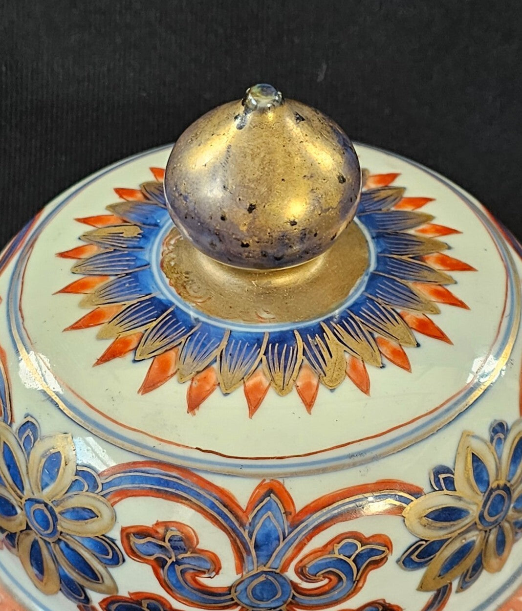 An Antique Chinese Porcelain Vase or Jar Cover, Encased in Brass