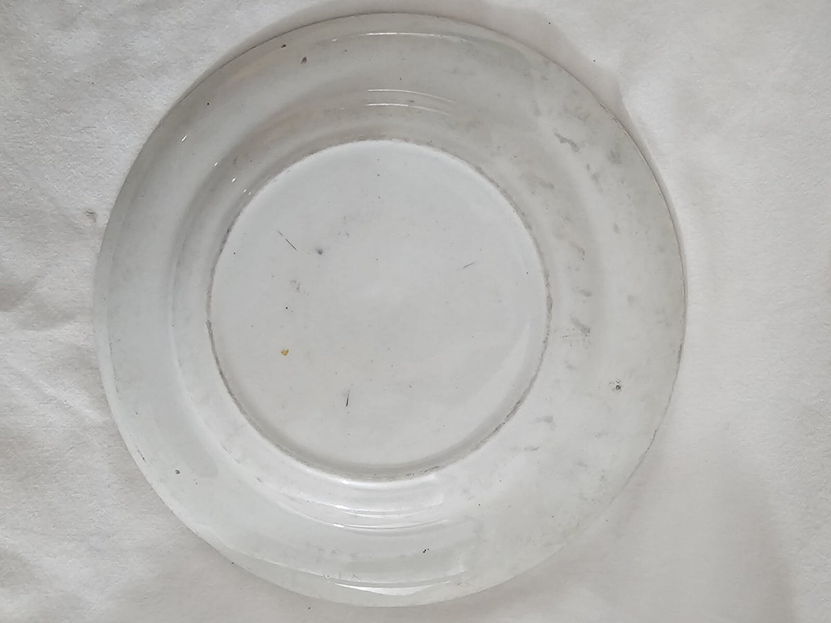 An Antique 19thC Prattware Plate with Green Boarder - Preparing for the Ride