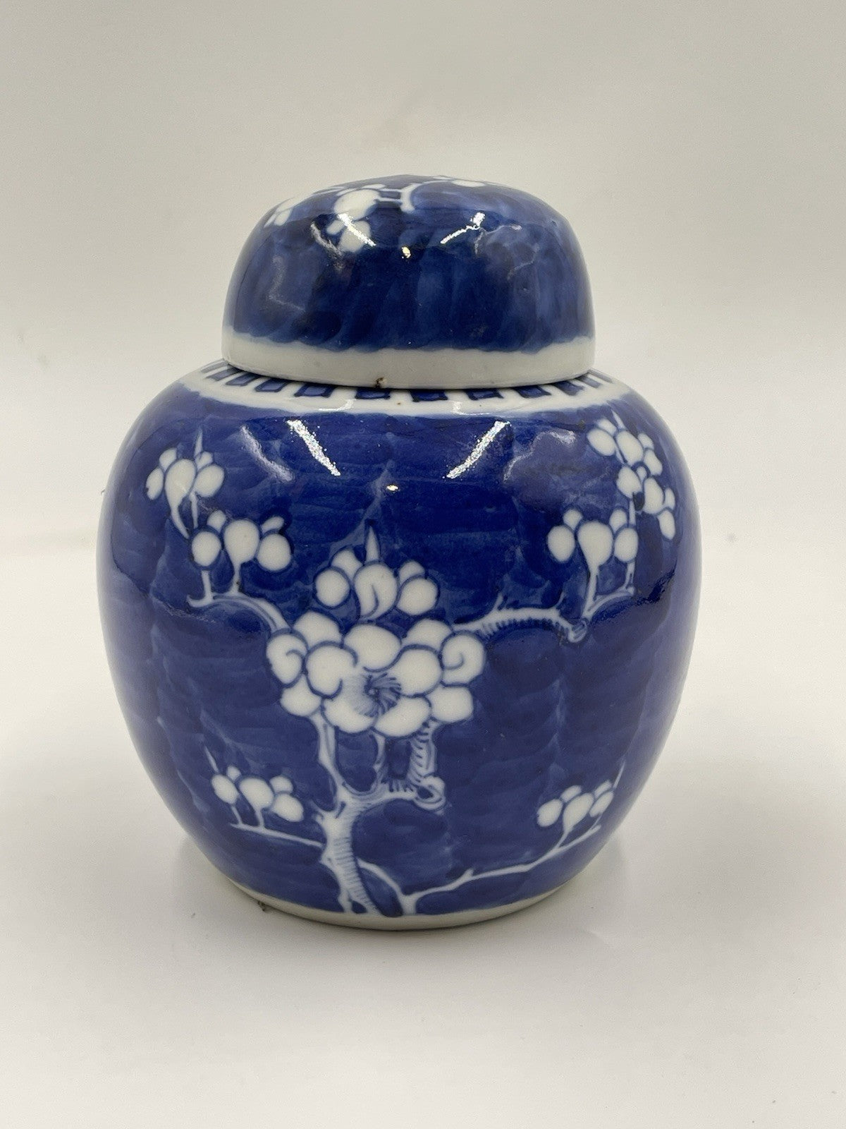 A Chinese Porcelain Ginger Jar and Cover Blue & White Prunus Pattern