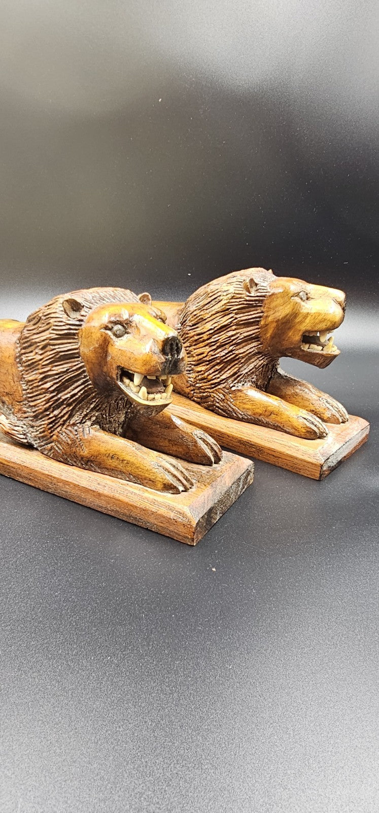 An Antique Pair of Treen Recumbent Lions Hand Carved
