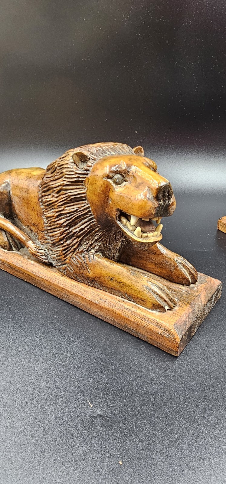 An Antique Pair of Treen Recumbent Lions Hand Carved