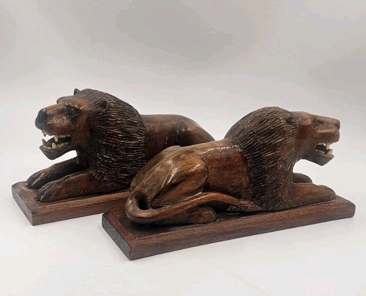 An Antique Pair of Treen Recumbent Lions Hand Carved