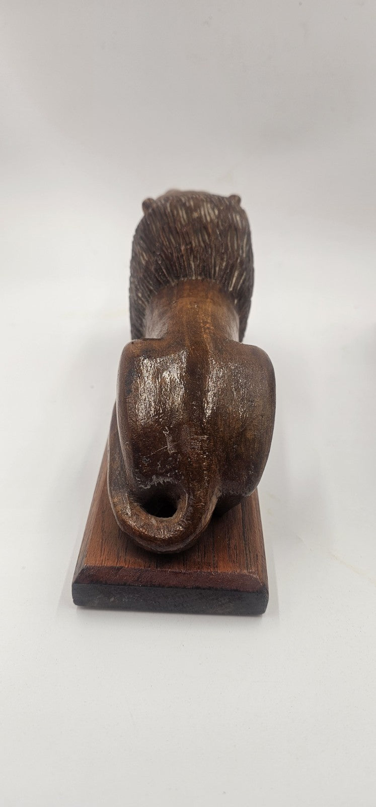 An Antique Pair of Treen Recumbent Lions Hand Carved