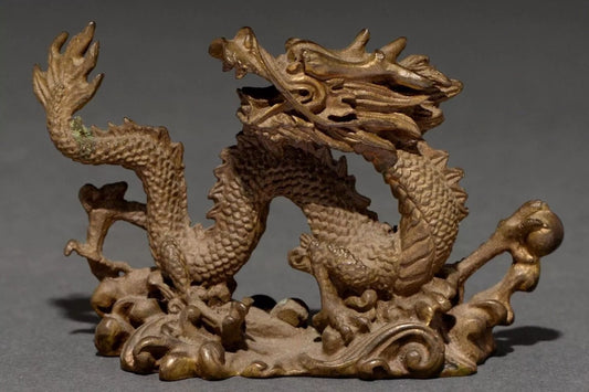 A Chinese Miniature Bronze Sculpture of a Dragon,