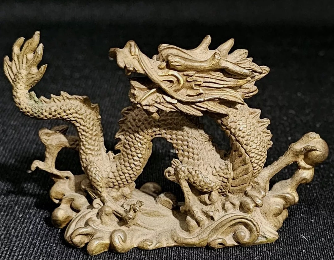 A Chinese Miniature Bronze Sculpture of a Dragon,