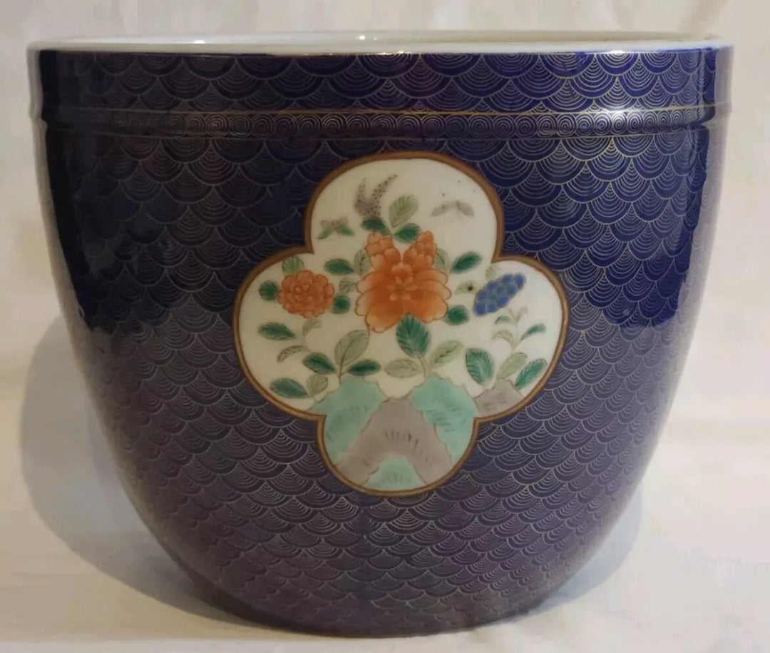 A Japanese Fukagawa Porcelain Jardiniere Painted with Floral Panels