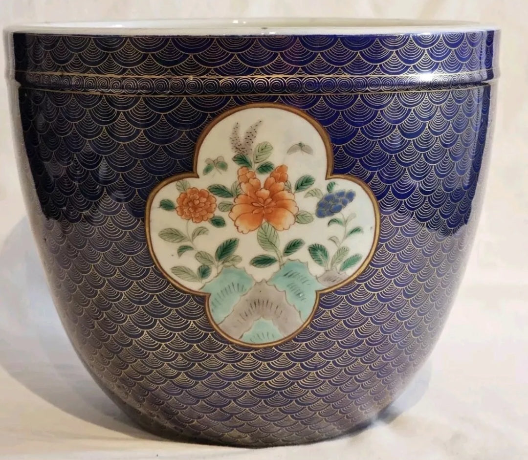 A Japanese Fukagawa Porcelain Jardiniere Painted with Floral Panels