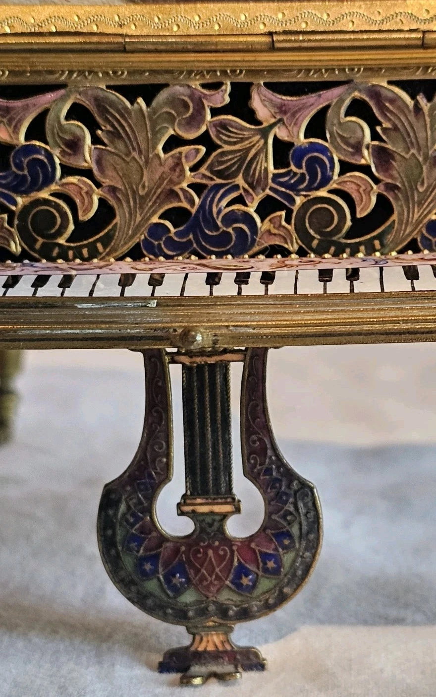 A 19thC French Musical Ormolu & Enamel Jewellery Box Modelled as a Grand Piano.