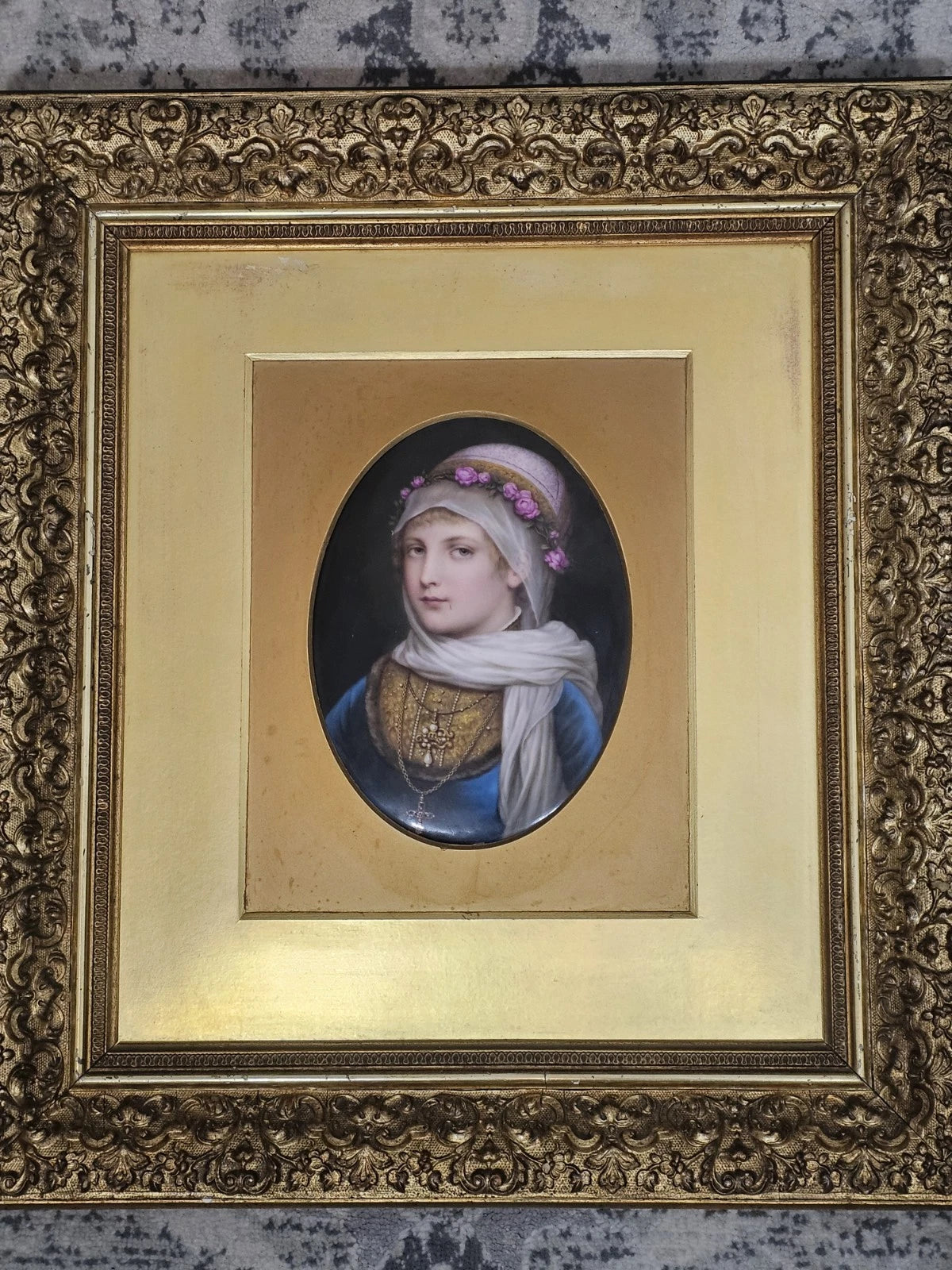 A 19thC German Porcelain Plaque of a Portrait of a Young Woman, Gilt Framed